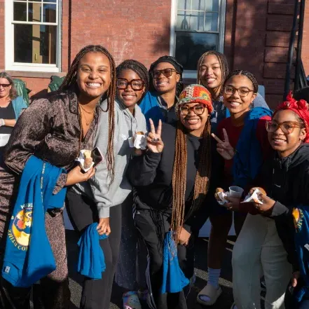 Students smile in a group on Mountain Day 2023