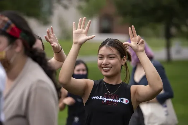 A student participating in a group activity.